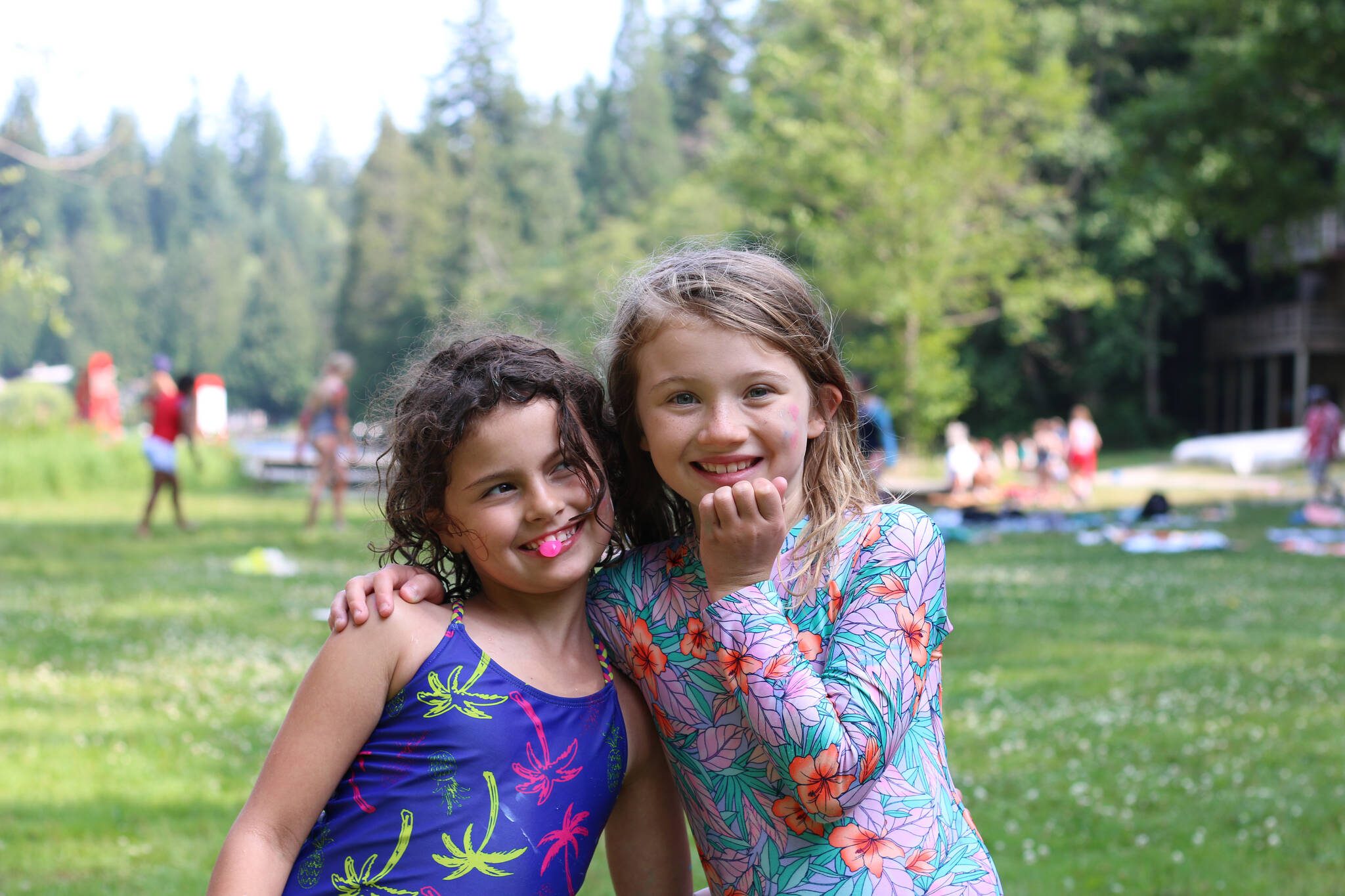 Camp Fire attendees pose after playing in the water. (Photo courtesy by Camp Fire)