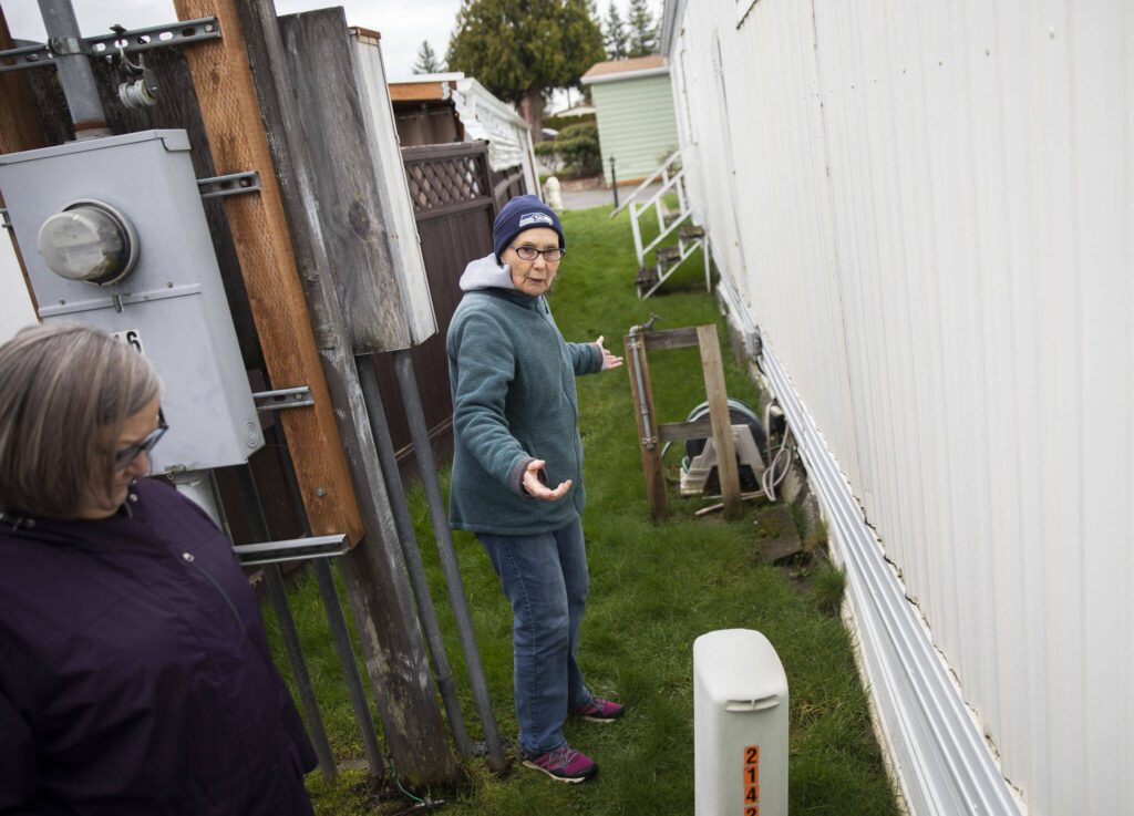 Royalwood Estates Mobile Home Park resident Sunny Thompson talks about some of the water related issues she had with her home that have not been remedied on Monday, March 11, 2024 in Lynnwood, Washington. (Olivia Vanni / The Herald)
