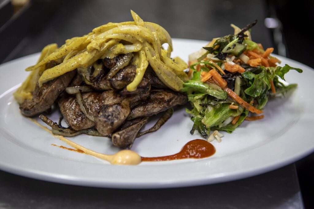 Grilled lamb at the African Heritage Restaurant on Saturday, April 6, 2024 in Everett, Washington. (Annie Barker / The Herald)
