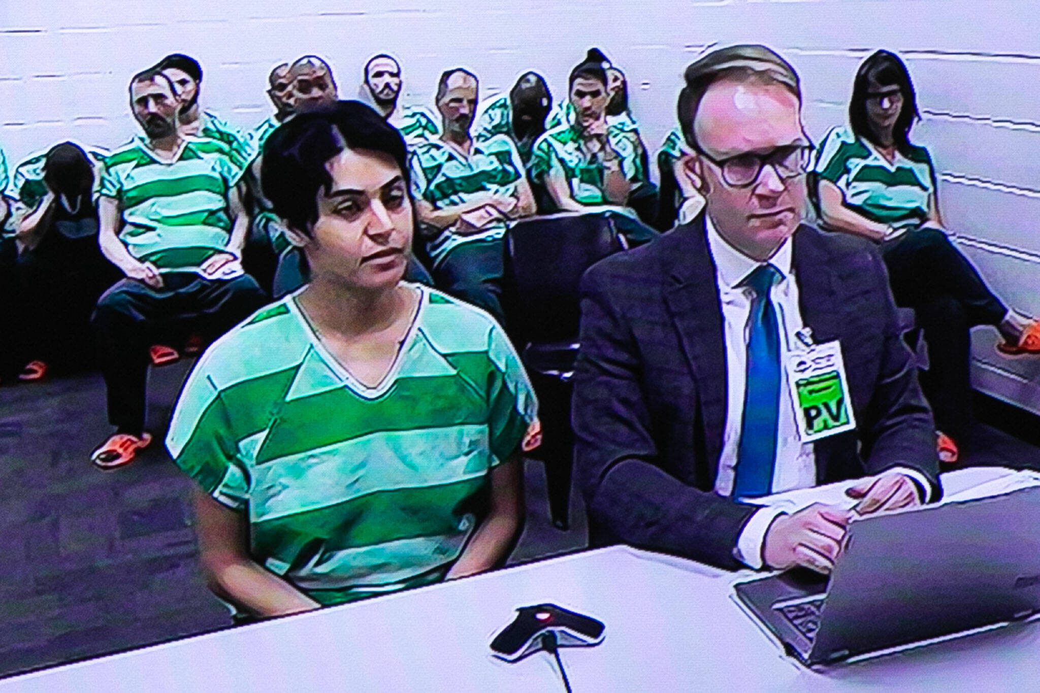 Janet Ernestina Garcia appears in court via video alongside defense attorney Max Mensinger for her bail hearing on Monday, April 1, 2024, at Snohomish County Superior Court in Everett, Washington. (Ryan Berry / The Herald)