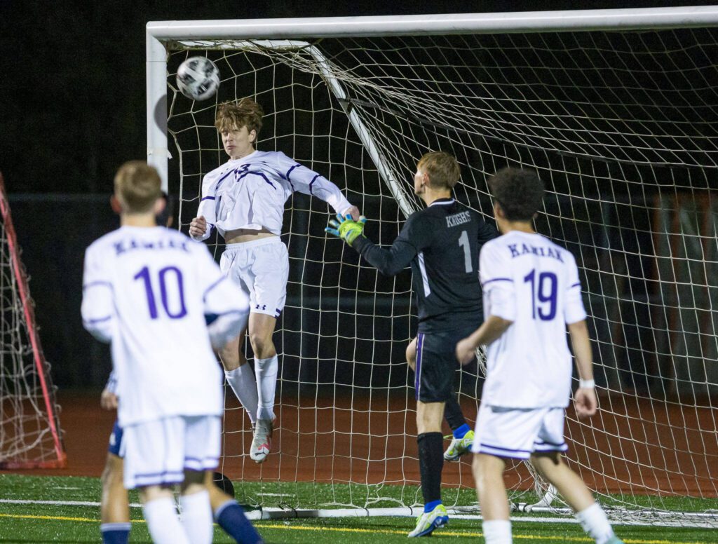 Kamiak’s Max George blocks a shot on goal with his head during the game against Glacier Peak on Monday, April 1, 2024 in Snohomish, Washington. (Olivia Vanni / The Herald)

