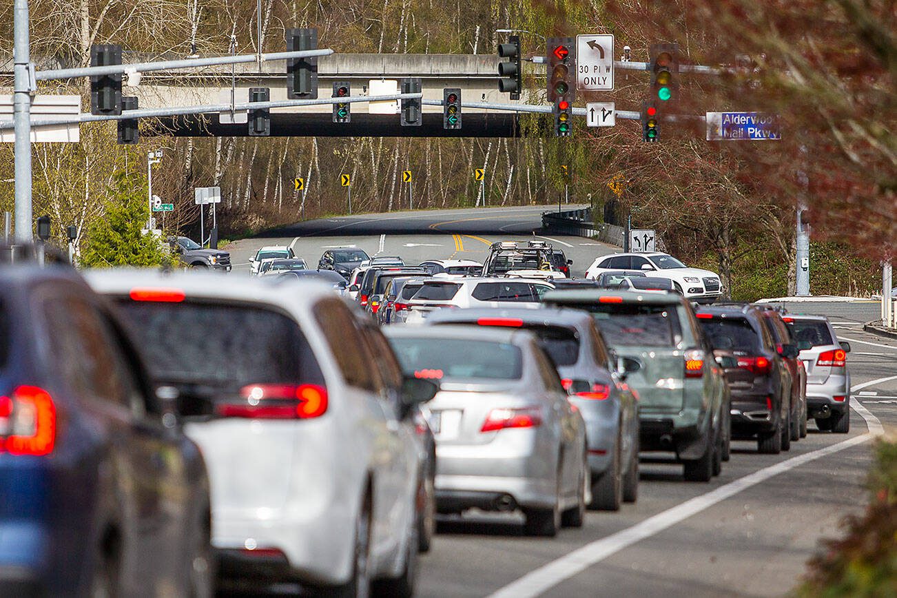 Traffic idles while waiting for the lights to change along 33rd Avenue West on Tuesday, April 2, 2024 in Lynnwood, Washington. (Olivia Vanni / The Herald)