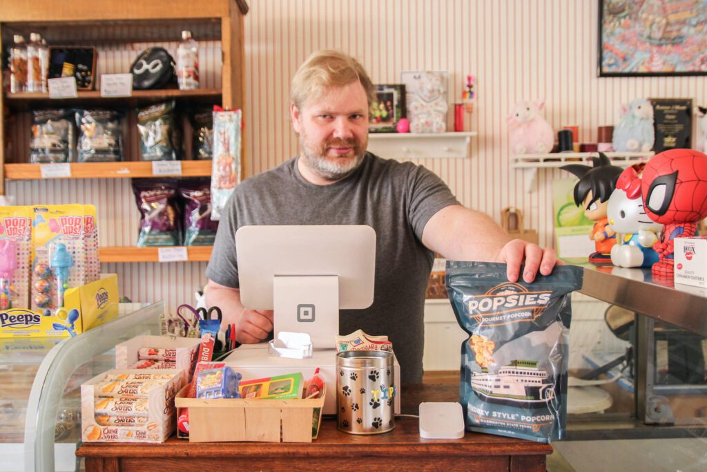 Owner Andy Plumlee in Popsies in Oak Harbor. (Photo provided by Whidbey News-Times)
