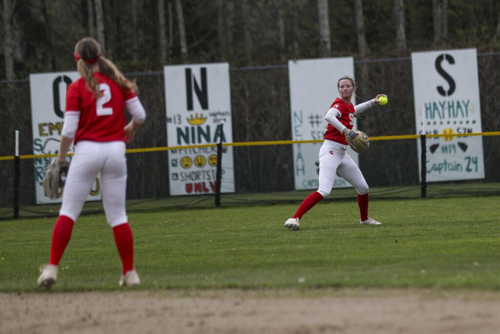 Stanwood’s Reagan Ryan (25) throws the ball during a prep softball game between Stanwood and Jackson at Henry M. Jackson High School on Tuesday, April 2, 2024 in Mill Creek, Washington. Jackson won, 6-0. (Annie Barker / The Herald)
