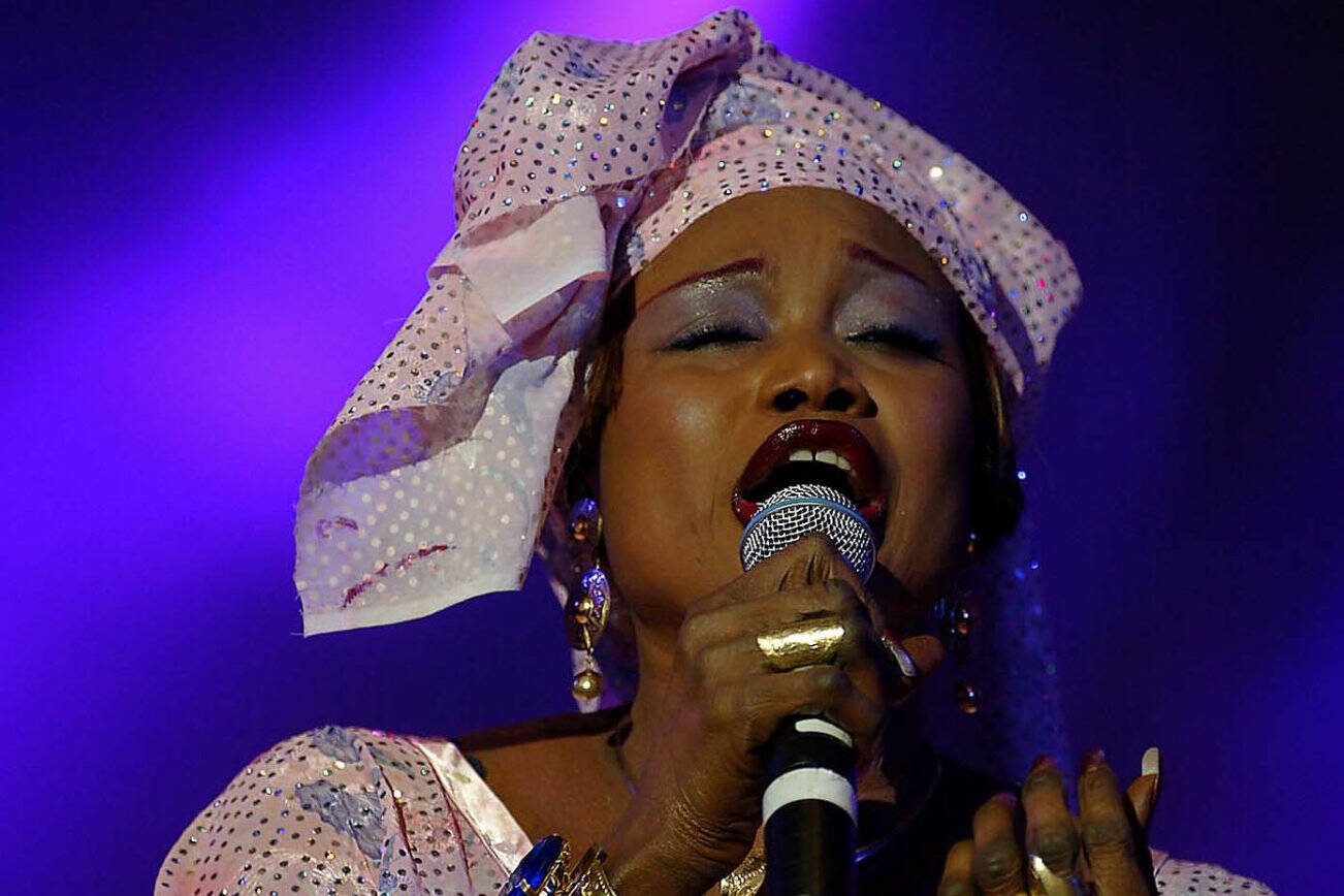 Oumou Sangare, from Senegal, performs at the "Africa Standing Tall Against Poverty" in concert with Live8 in Johannesburg Saturday July 2, 2005. (AP Photo)