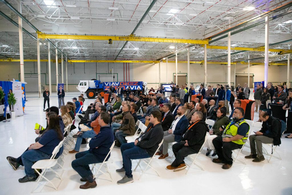 People gather during an event at ZeroAvia’s new facility on Wednesday, April 24, 2024, near Paine Field in Everett, Washington. (Ryan Berry / The Herald)
