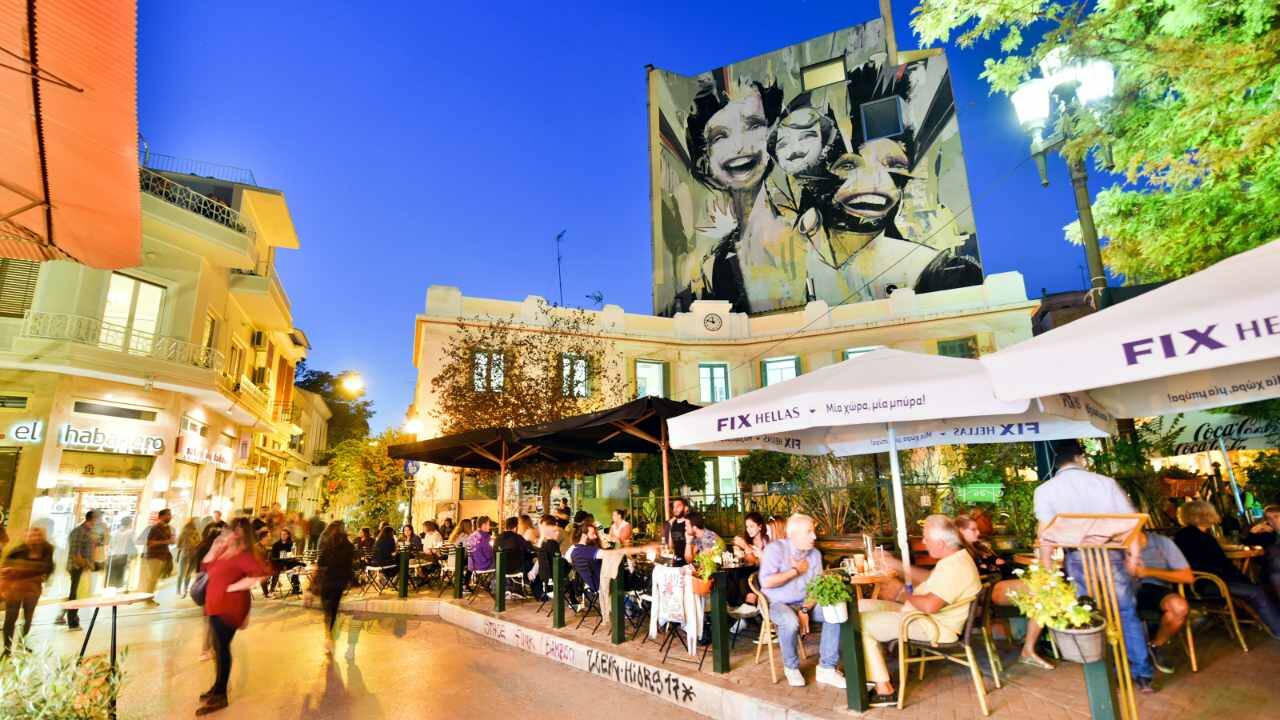 In the “rickety-chic” Psyrri neighborhood of Athens, you’ll find slick outdoor restaurants next to vibrant street art. (Cameron Hewitt)
In the “rickety-chic” Psyrri neighborhood of Athens, you’ll find slick outdoor restaurants next to vibrant street art. (Cameron Hewitt)
