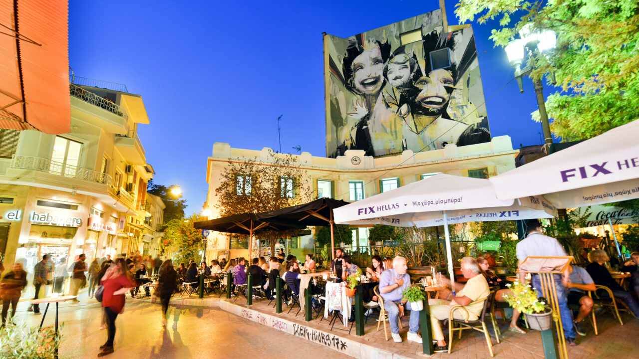 In the rickety-chic Psyrri neighborhood of Athens, youll find slick outdoor restaurants next to vibrant street art. (Cameron Hewitt)
In the rickety-chic Psyrri neighborhood of Athens, youll find slick outdoor restaurants next to vibrant street art. (Cameron Hewitt)