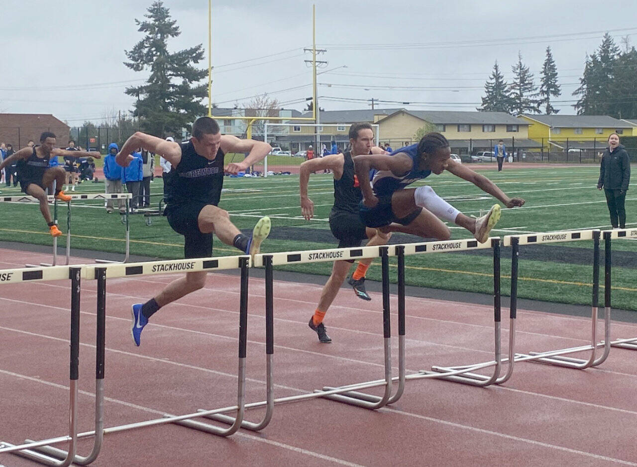 Mariner’s Stephen Anderson leads the pack in the boys 110-meter hurdles during a meet Thursday at Goddard Stadium. (Evan Wiederspohn / The Herald)