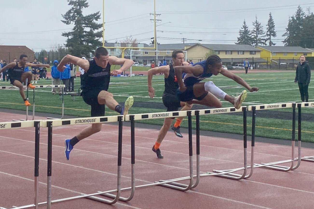 Mariner's Stephen Anderson leads the pack in the boys 110-meter hurdles during a meet Thursday at Goddard Stadium. (Evan Wiederspohn / The Herald)