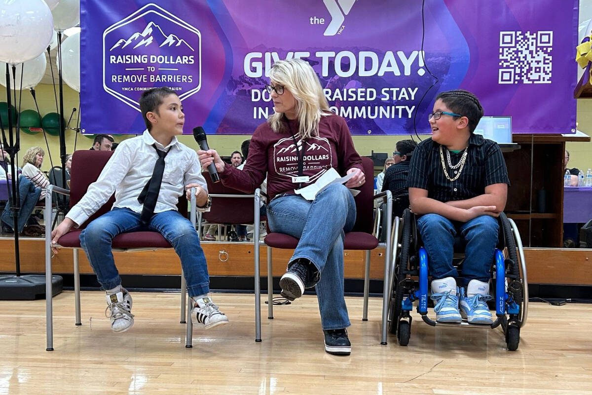 Lake Stevens brothers, Edge and Ezra Burkett, can’t wait to get back out on the field for Miracle League Baseball. Photo courtesy YMCA of Snohomish County