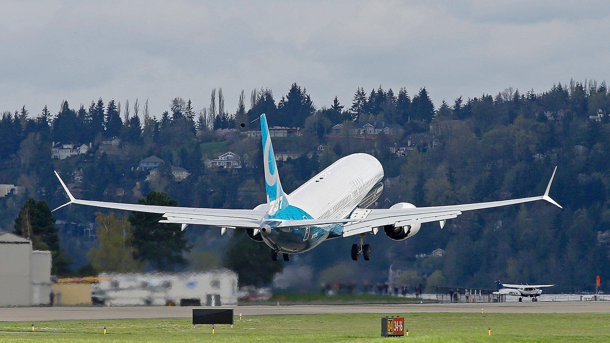 A Boeing 737 MAX 9 airplane takes on its first flight, Thursday, April 13, 2017, in Renton, Wash. (AP Photo/Ted S. Warren)
