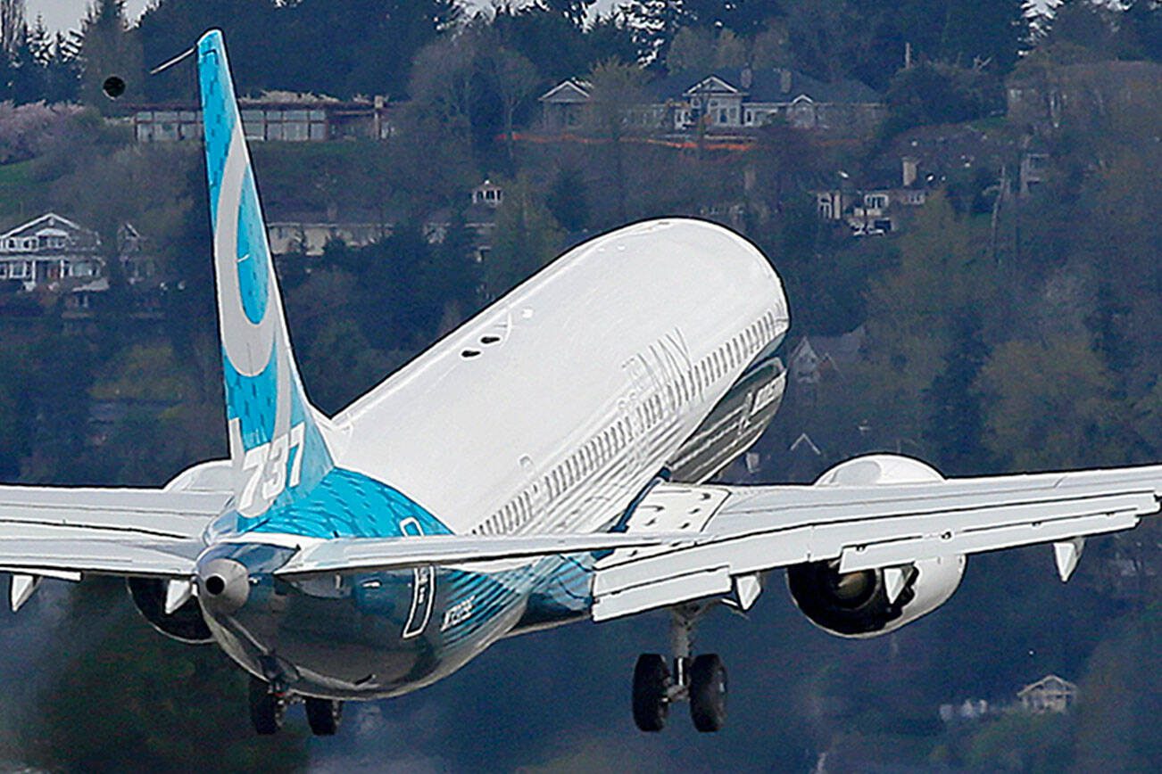 A Boeing 737 MAX 9 airplane takes off on its first flight, Thursday, April 13, 2017, in Renton, Wash. (AP Photo/Ted S. Warren)