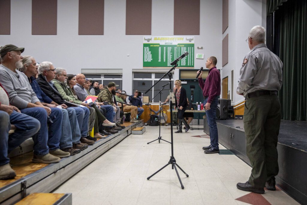 U.S. Fish and Wildlife Service State Supervisor Brad Thompson speaks during a meeting for public comment on the topic of bringing grizzly bears to the North Cascades at Darrington High School Auditorium in Darrington, Washington on Thursday, Nov. 2, 2023. (Annie Barker / The Herald)
