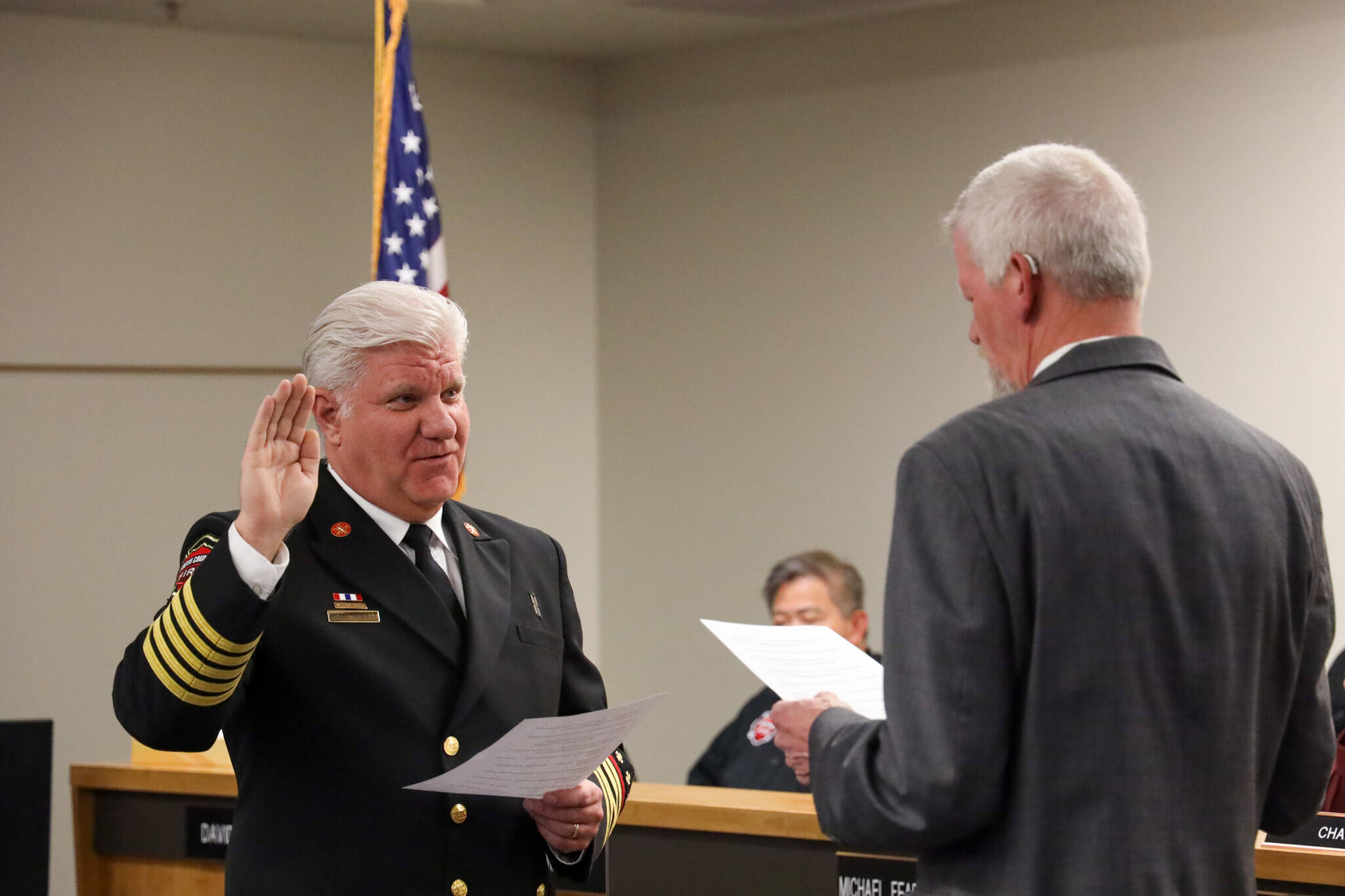 South County Fire Commissioner Ed Widdis swears in Fire Chief Bob Eastman on April 2, 2024 South County Fire).