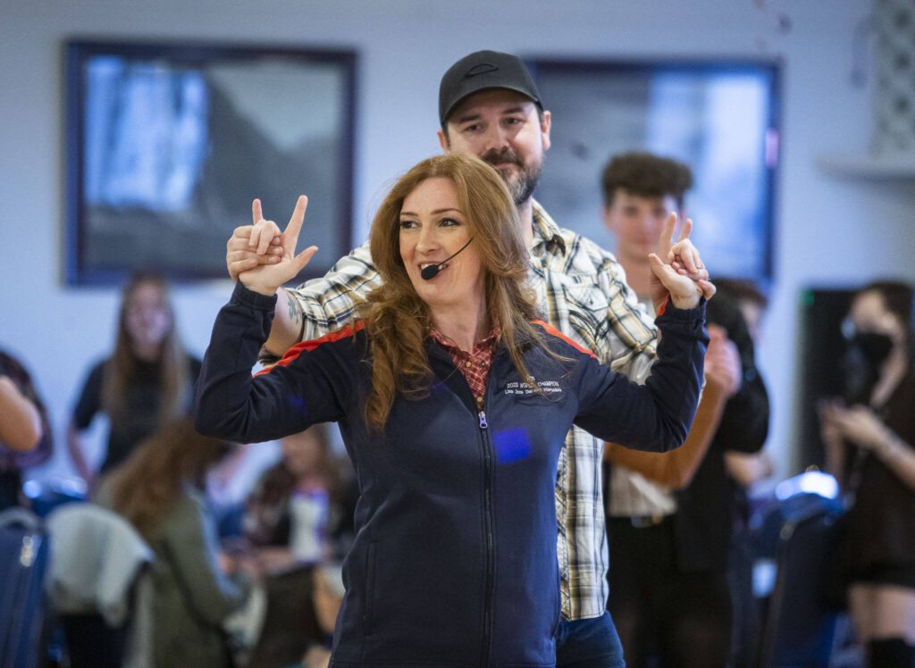 Country dance instructor Jen Workman, left, and husband Brian Workman, right, go through steps with a country dance class at Normanna Lodge on Tuesday, April 9, 2024 in Everett, Washington. (Olivia Vanni / The Herald)
