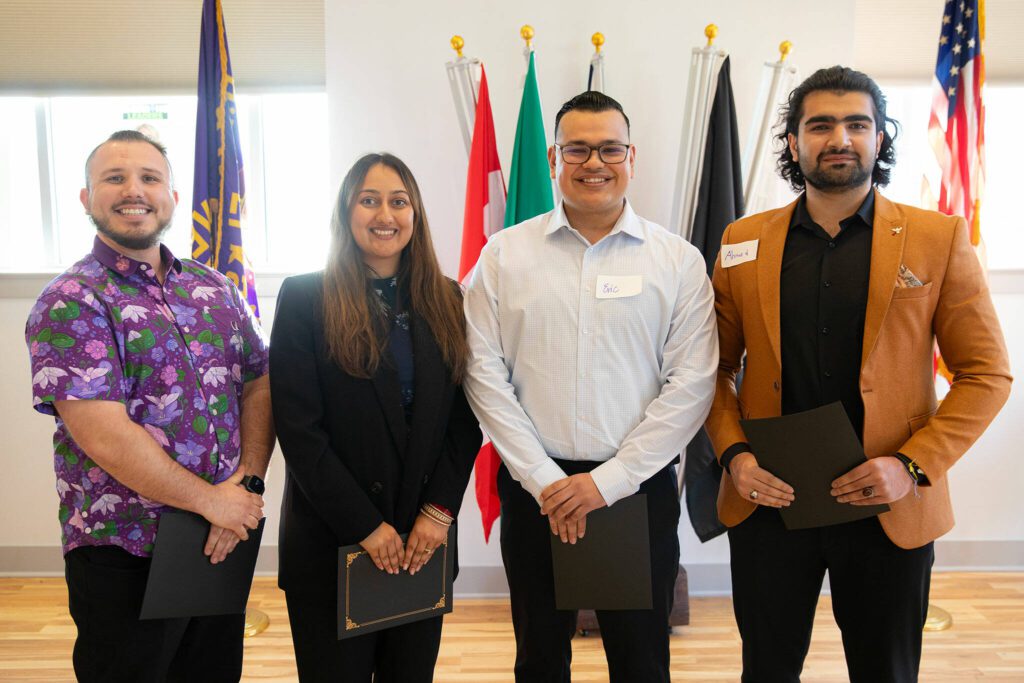 Nathanael Engen, Simreet Dhaliwal, Eric Jimenez and Ahmad Hilal Abid make up the top 4 during the 2024 Snohomish County Emerging Leaders Awards Presentation on Wednesday, April 17, 2024, in Everett, Washington. (Ryan Berry / The Herald)
