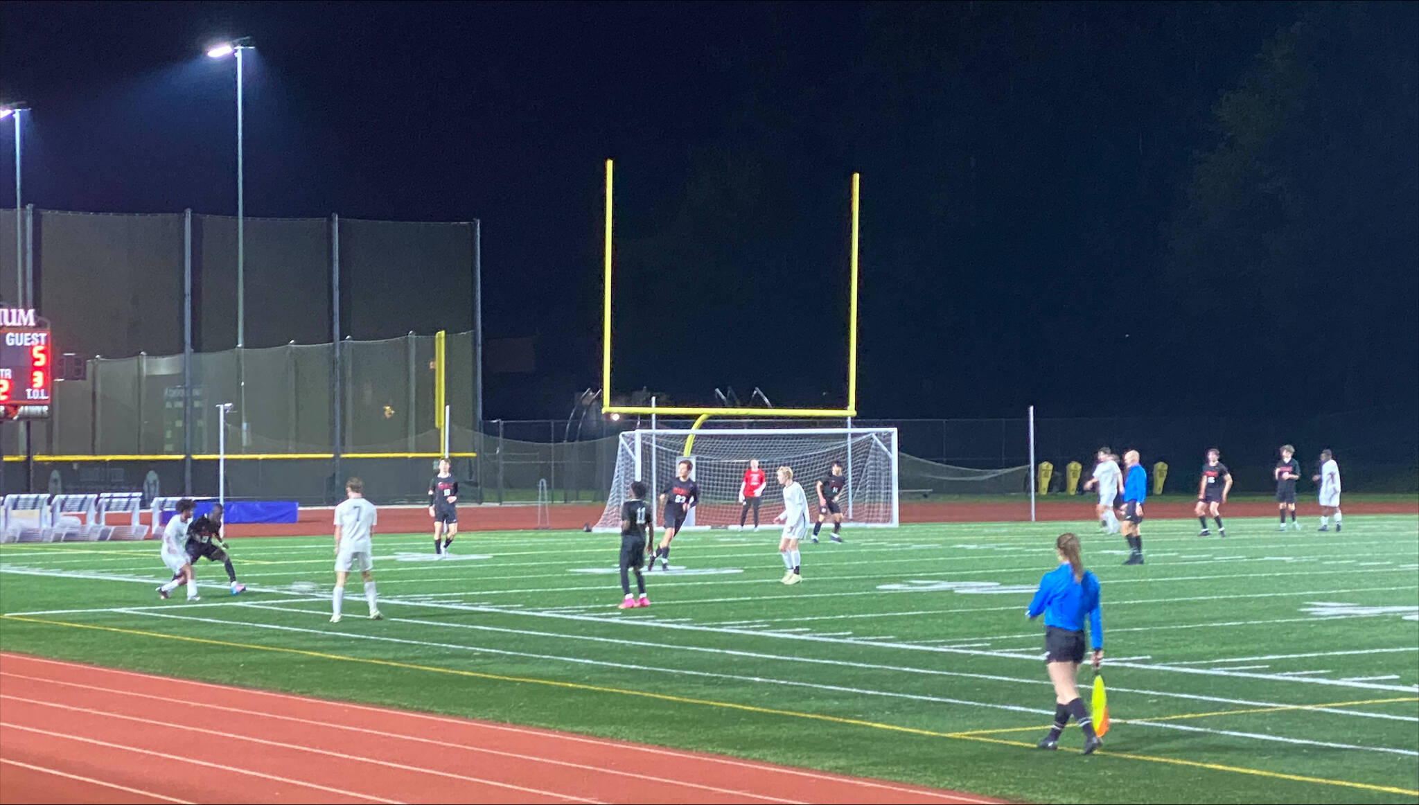 The Shorecrest High School boys soccer team plays keep away in the final minutes of a 5-0 victory over Mountlake Terrace on Wednesday at Edmonds Stadium. (Evan Wiederspohn / The Herald)