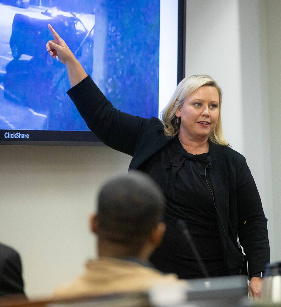 Defense attorney Rachel Forde shows surveillance footage from an apartment parking lot during the new trial of Jamel Alexander on Tuesday, April 16, 2024, at Snohomish County Superior Court in Everett, Washington. (Ryan Berry / The Herald)
