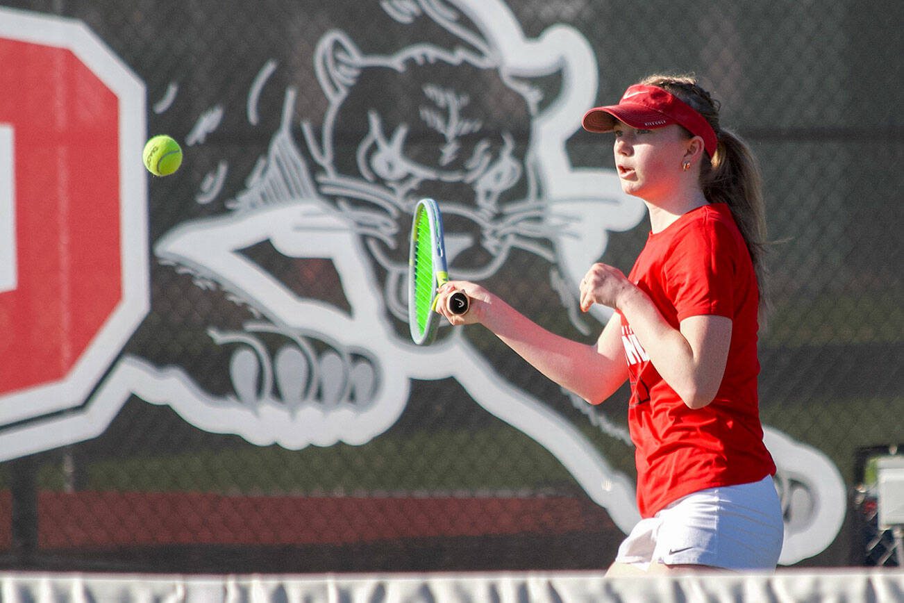 Snohomish's Morgan Gibson returns the ball in her match against Stanwood's Ryann Reep on Friday, April 12, 2024 in Snohomish, Washington. Gibson lost the first set 4-6 but rallied back to win 6-2 in the second and 6-0 in the third. The Panthers bested the Spartans 5-2. (Taras McCurdie / The Herald)