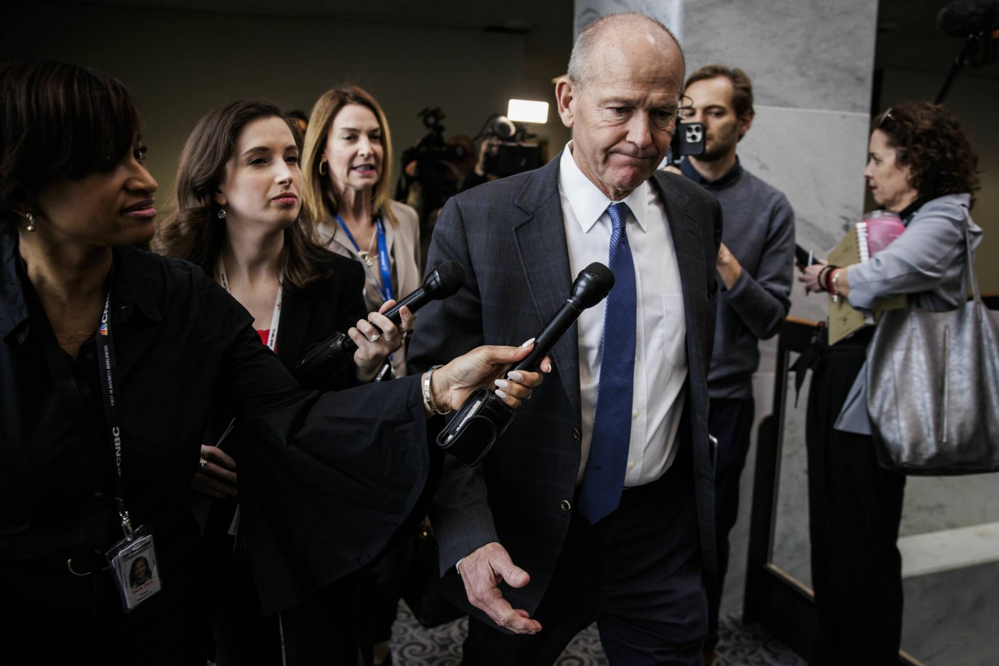 Dave Calhoun, center, on Capitol Hill in Washington, DC, on Jan. 24. (Samuel Corum / Bloomberg)