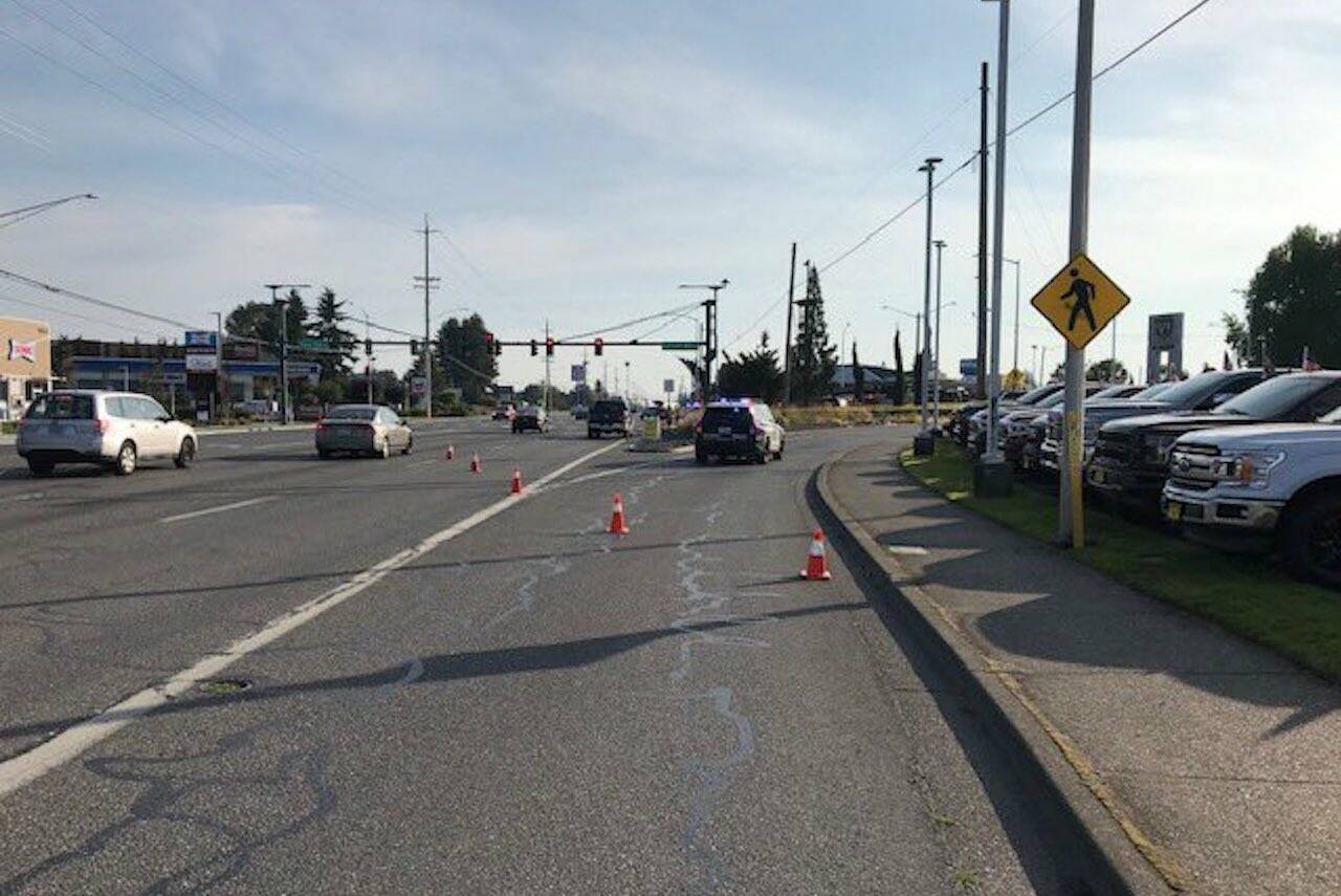 Everett police officers on the scene of a single-vehicle collision on Evergreen Way and Olivia Park Road Wednesday, July 5, 2023 in Everett, Washington. (Photo provided by Everett Police Department)