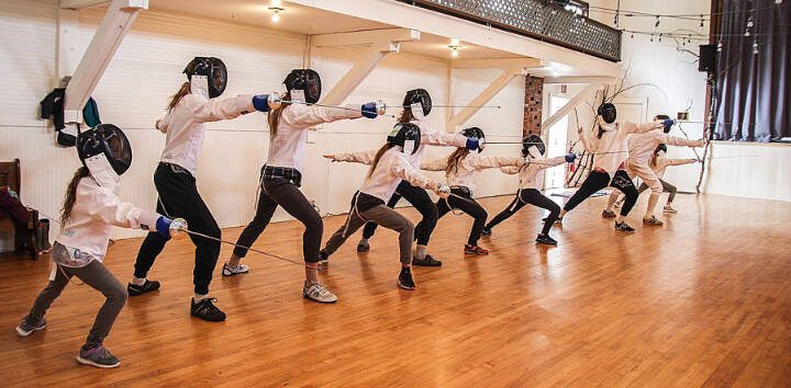 Students practice their foil-fencing form during a class at Bayview Community Hall in Langley. (Luisa Loi / Whidbey News-Times)
