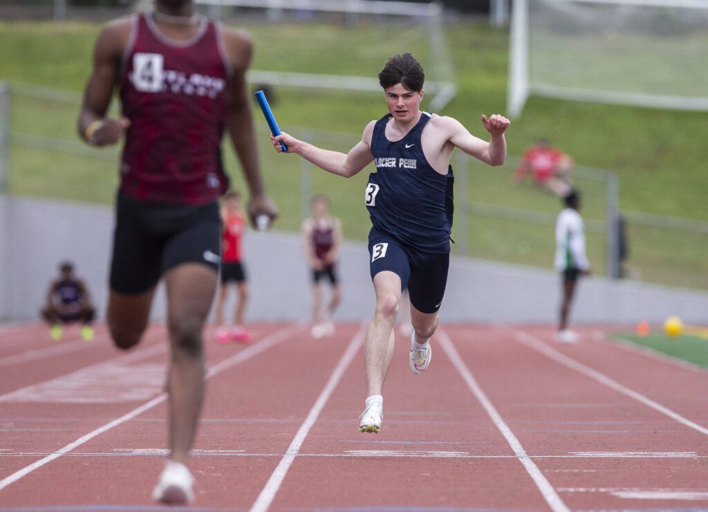 Glacier Peak’s Mateo Ganje crosses the finish line in the boys 400-meter relay during the Eason Invitational at Snohomish High School on Saturday, April 20, 2024 in Snohomish, Washington. (Olivia Vanni / The Herald)
