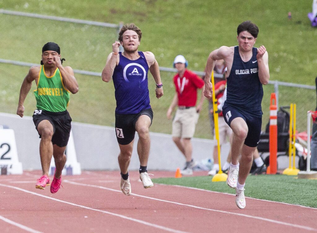 Glacier Peak’s Mateo Ganje runs in the boys 100 meters during the Eason Invitational at Snohomish High School on Saturday, April 20, 2024 in Snohomish, Washington. Ganje placed second with a time of 10.63 seconds. (Olivia Vanni / The Herald)

