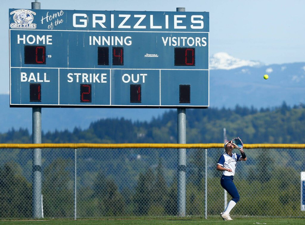 Glacier Peak’s Sammie Christensen pulls in a deep fly ball against Lake Stevens on Tuesday, April 23, 2024, at Glacier Peak High School in Snohomish, Washington. (Ryan Berry / The Herald)
