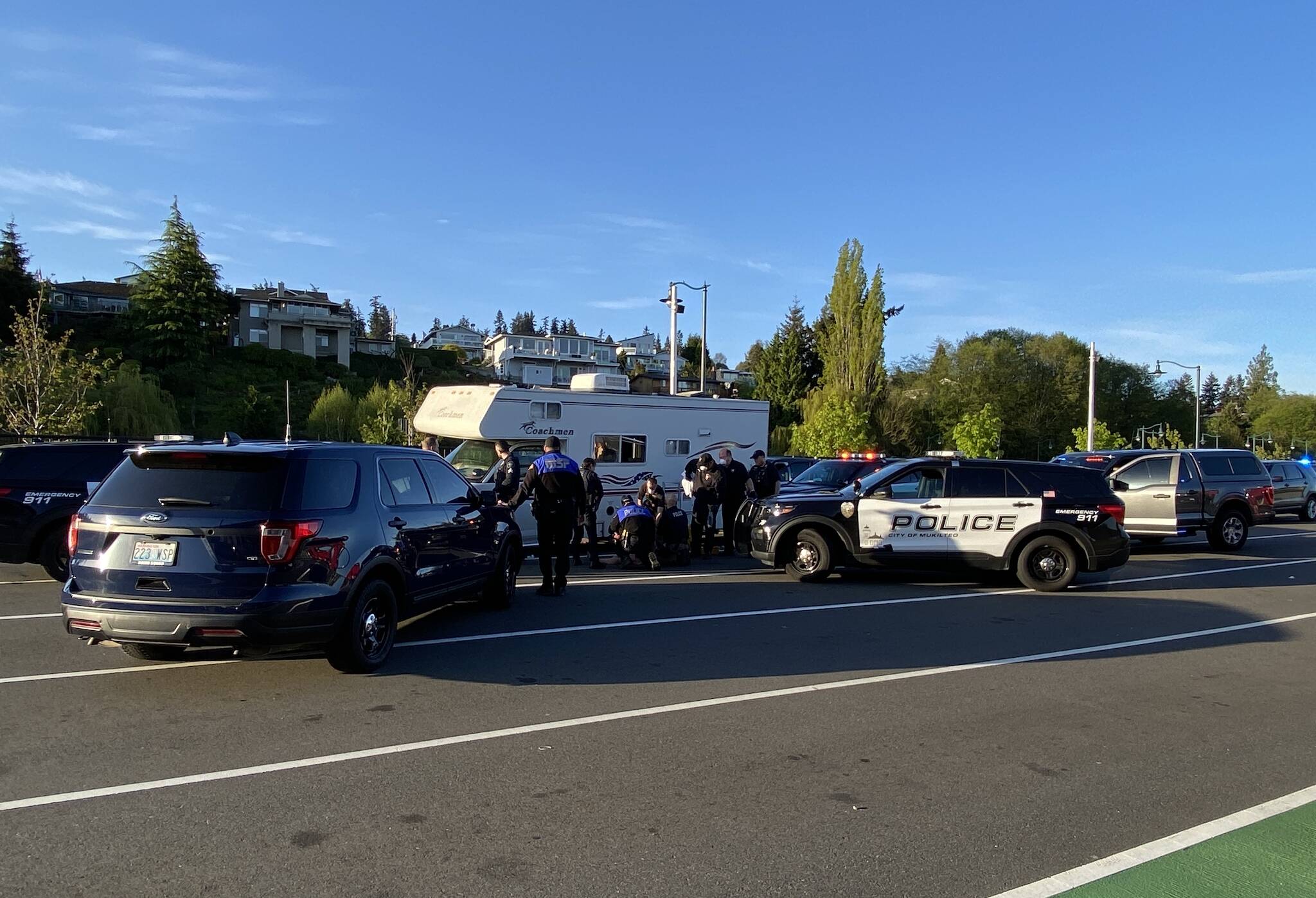 Officers respond to a ferry traffic disturbance Tuesday after a woman in a motorhome threatened to drive off the dock, authorities said. (Photo provided by Mukilteo Police Department)
