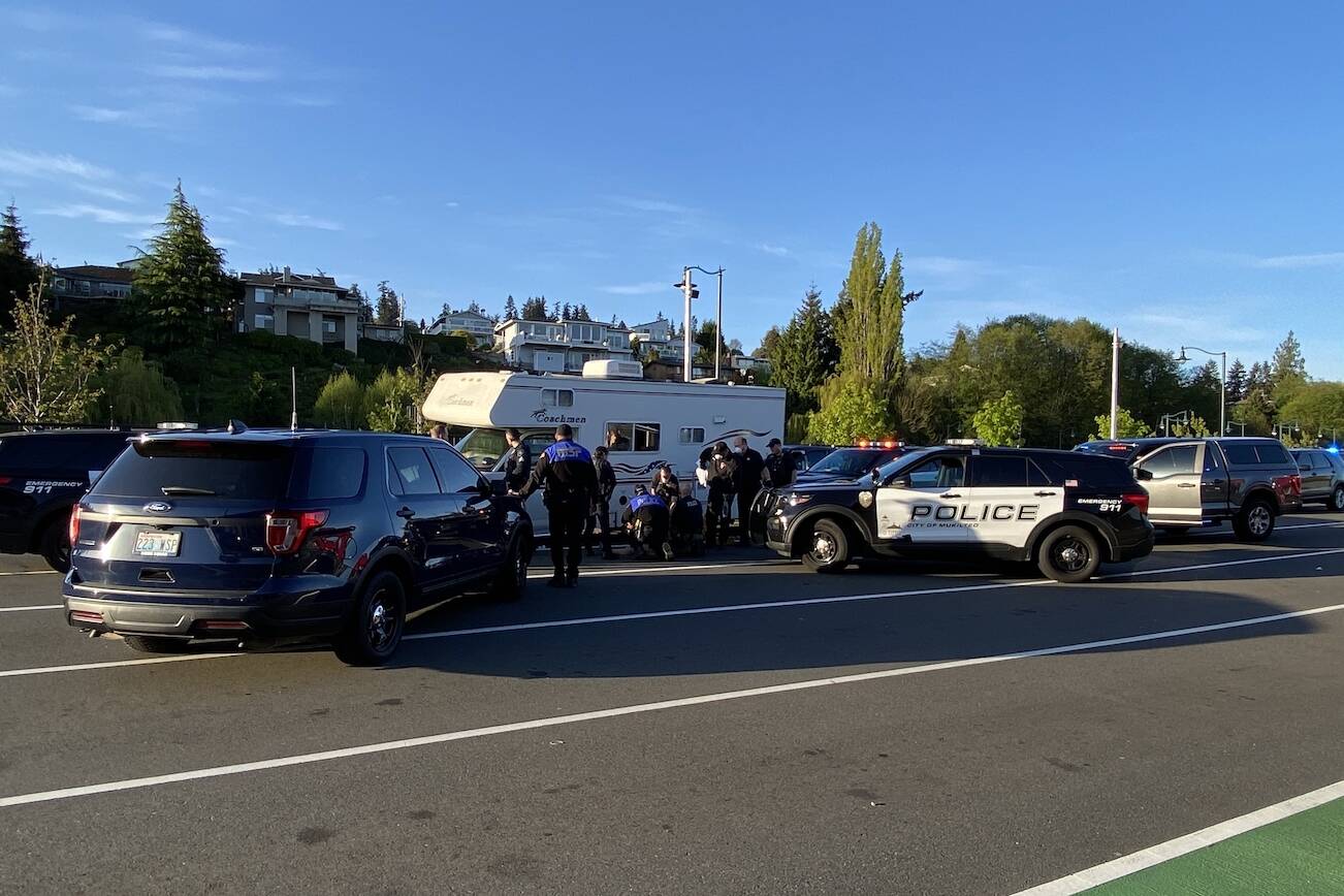 Officers respond to a ferry traffic disturbance Tuesday after a woman in a motorhome threatened to drive off the dock, authorities said. (Photo provided by Mukilteo Police Department)