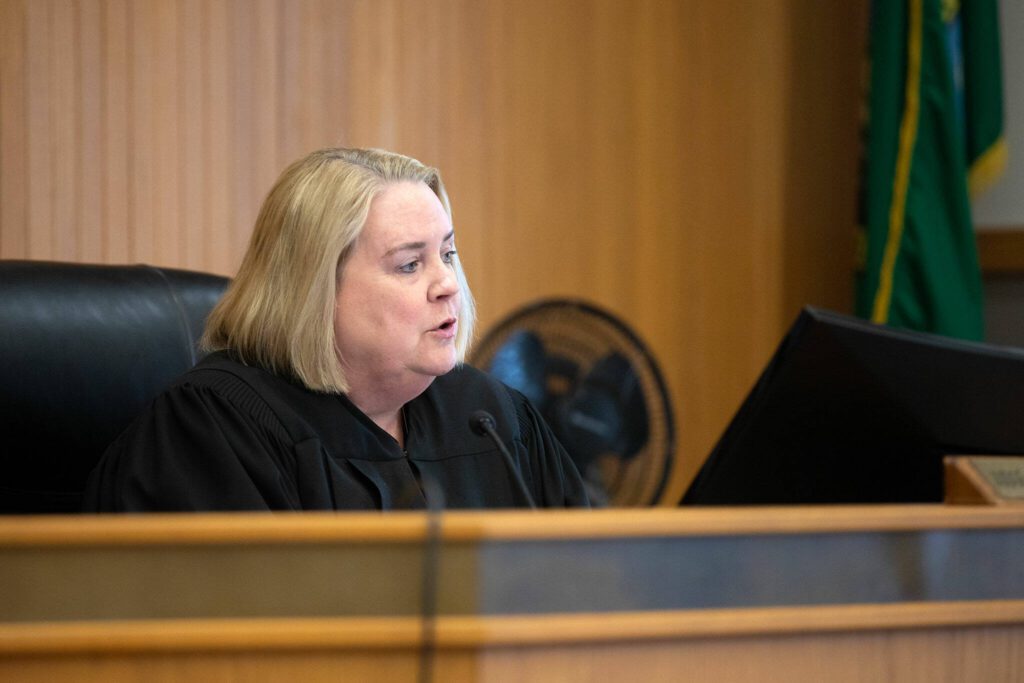 Judge Millie M. Judge speaks to Alan Edward Dean during his sentencing Wednesday, April 24, 2024, at Snohomish County Superior Court in Everett, Washington. (Ryan Berry / The Herald)
