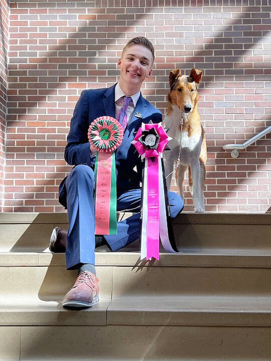 Brayden Burn, a junior at Oak Harbor High School and a volunteer firefighter at North Whidbey Fire and Rescue, is the first boy in 21 years to win Best in Show at the Collie Club of Americas National Specialty dog show, which was held earlier this month in Peoria, Arizona. (Provided photo)
