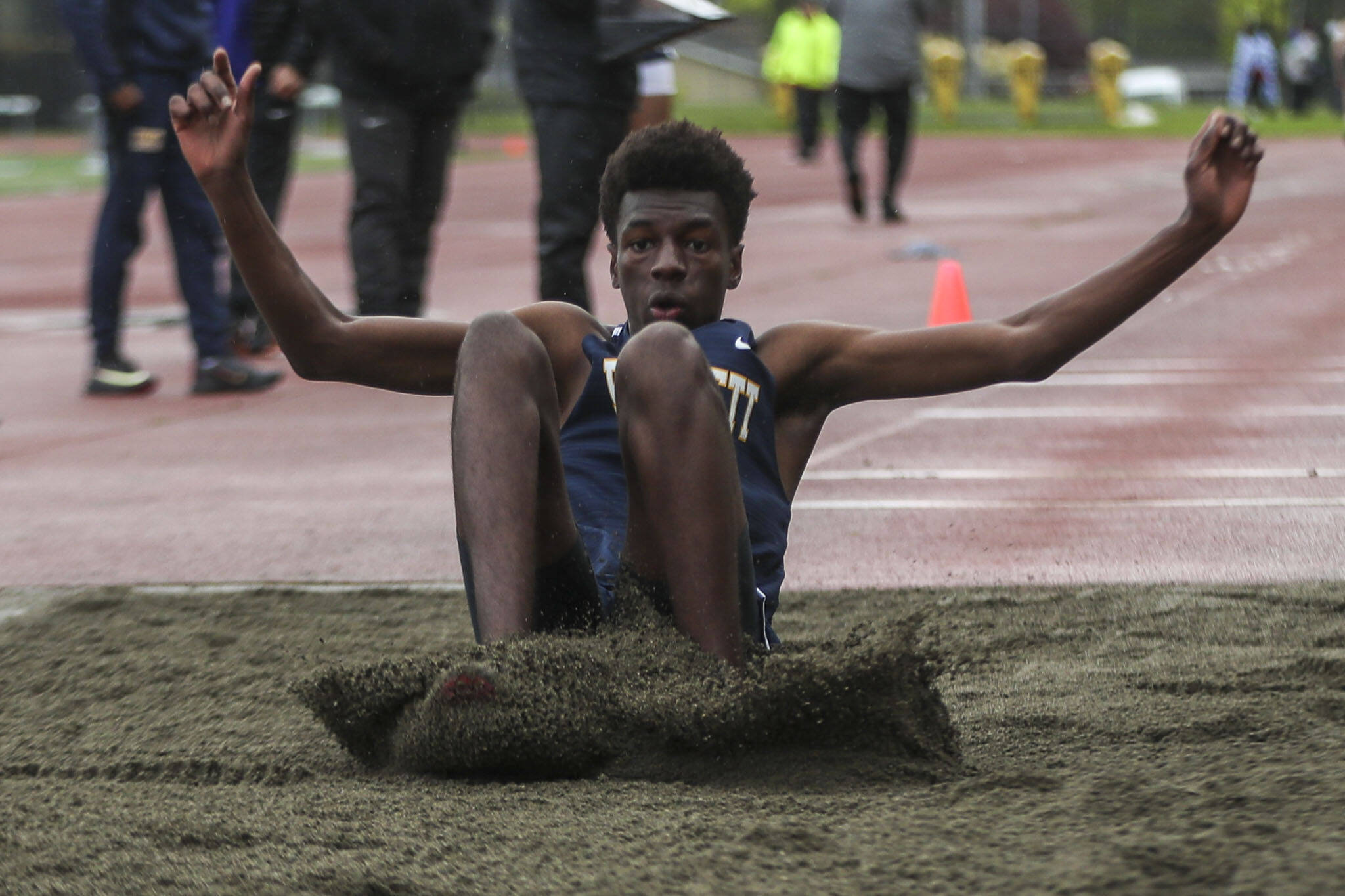 Everett’s Shukurani Ndayiragije participates in the triple jump event during a track meet between Lynnwood, Everett, and Edmonds-Woodway at Edmonds District Stadium on Thursday, April 25, 2024 in Edmonds, Washington. (Annie Barker / The Herald)