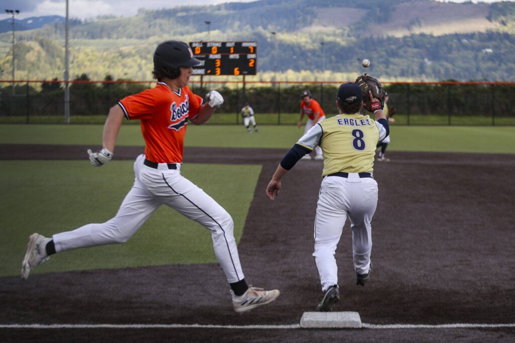 Arlington’s Aiden Jones (8) moves to catch the ball during a baseball game between Monroe and Arlington at Monroe High School on Friday, April 26, 2024 in Monroe, Washington. Monroe secured a win in an eighth inning, 4-3. (Annie Barker / The Herald)
