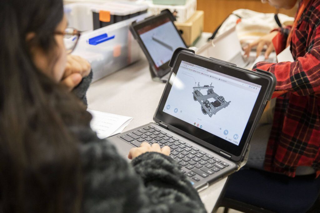 Students look at plans for a VEX Robotics project at Tulalip Heritage High School on Wednesday, April 24, 2024 in Marysville, Washington. (Olivia Vanni / The Herald)

