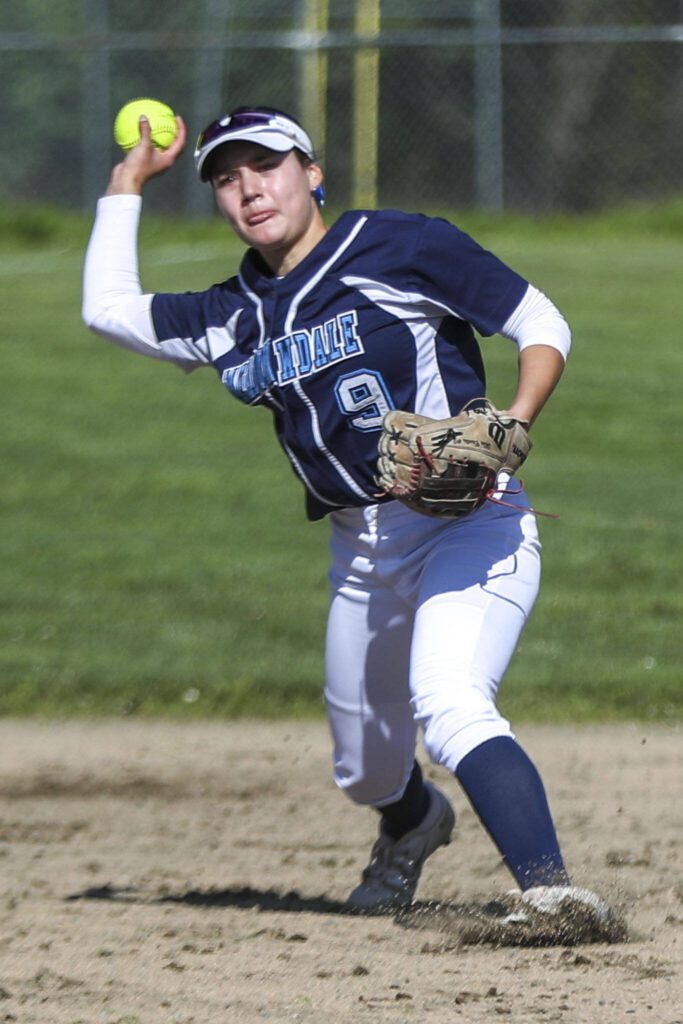 Meadowdale’s Mia Cantu throws during a softball game between Meadowdale and Marysville Getchell on Wednesday, May 1, 2024 in Marysville, Washington. Meadowdale won, 12-9. (Annie Barker / The Herald)
