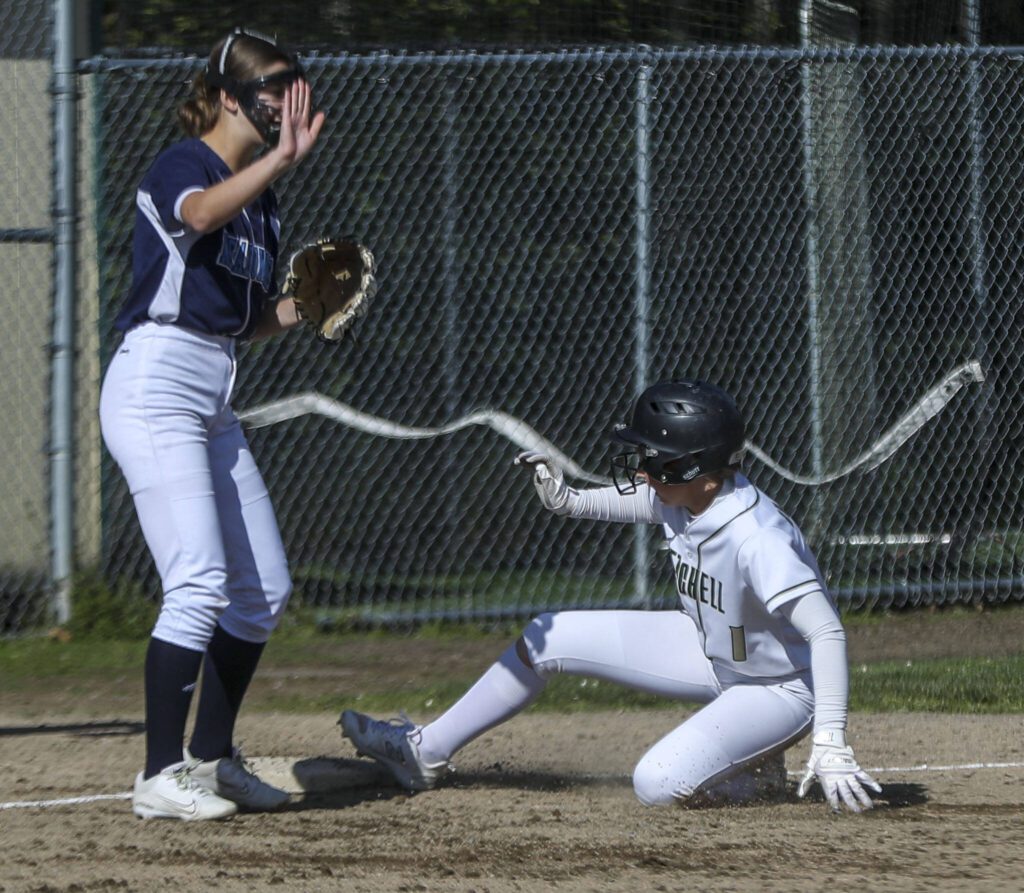 Marysville Getchell’s Jaidyn Swanson (1) slides into third during a softball game between Meadowdale and Marysville Getchell on Wednesday, May 1, 2024 in Marysville, Washington. Meadowdale won, 12-9. (Annie Barker / The Herald)
