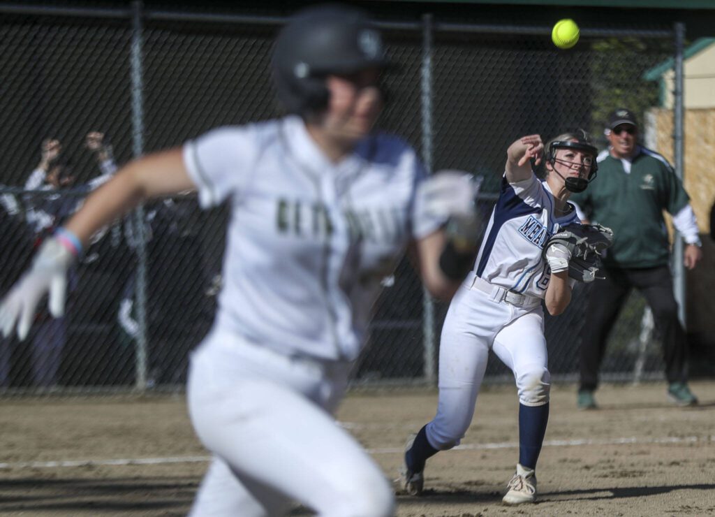 Meadowdale’s Jaeden Sajec (8) throws the ball during a softball game between Meadowdale and Marysville Getchell on Wednesday, May 1, 2024 in Marysville, Washington. Meadowdale won, 12-9. (Annie Barker / The Herald)
