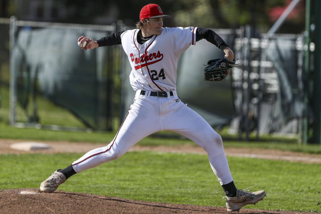Snohomish’s Luke Davis (24) pitches during a District 1 3A baseball game between Meadowdale and Snohomish at Snohomish High School on Monday, April 30, 2024 in Snohomish, Washington. Snohomish won, 3-1. (Annie Barker / The Herald)
