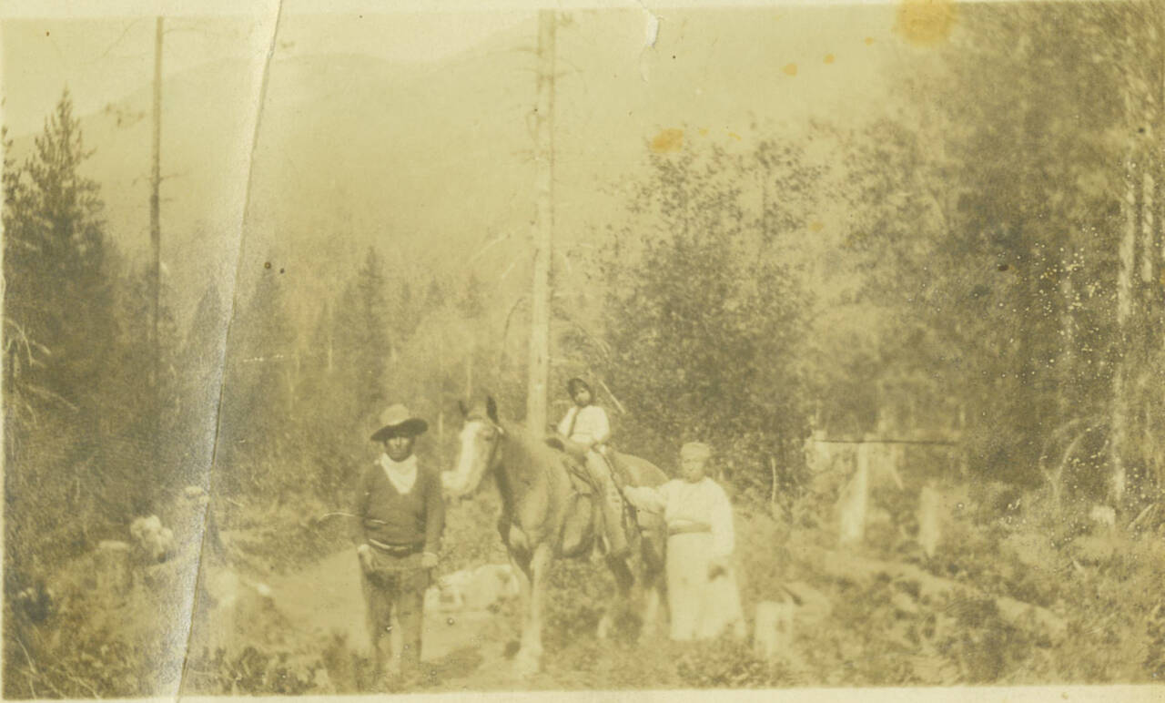 Photo courtesy of Kara Briggs
Sauk-Suiattle Chief Jim Brown, a young granddaughter, and daughter Ellen, near Packwood, Wash., circa 1910.