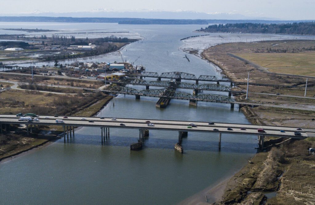 I-5, Highway 529 and BNSF railroad bridges cross over Union Slough, as the main routes for traffic between Everett and Marysville. (Olivia Vanni / The Herald)
