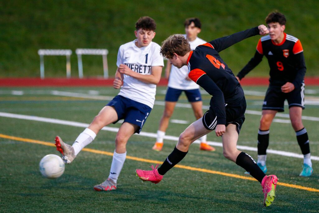 Monroe’s Gavin Nolan scores the first goal of the contest during a 3A District soccer match against Everett on Thursday, May 2, 2024, at Monroe High School in Monroe, Washington. (Ryan Berry / The Herald)
