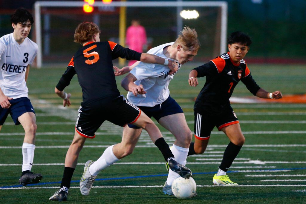 Everett’s Nathan Raines fights his way to the box before getting fouled for a penalty kick during a 3A District soccer match against Monroe on Thursday, May 2, 2024, at Monroe High School in Monroe, Washington. (Ryan Berry / The Herald)
