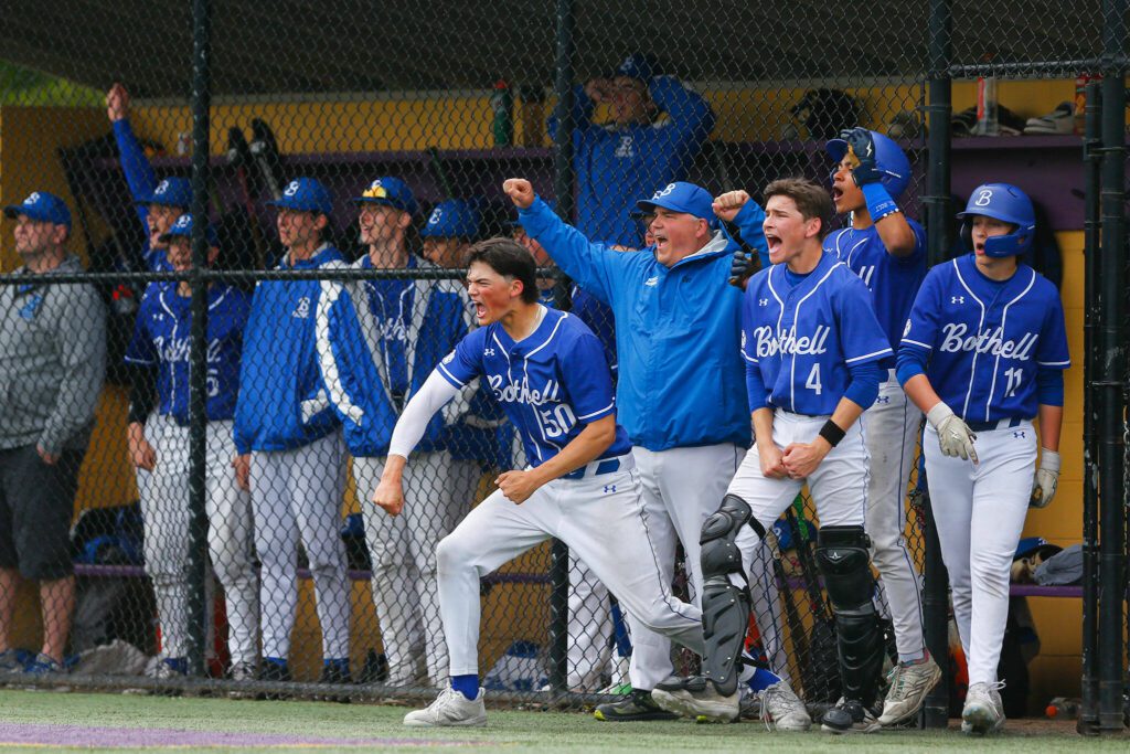 Bothell’s dugout goes wild after a Nolan Ledoux homer during a playoff baseball game against Lake Stevens on Saturday, May 4, 2024, in Lake Stevens, Washington. (Ryan Berry / The Herald)

