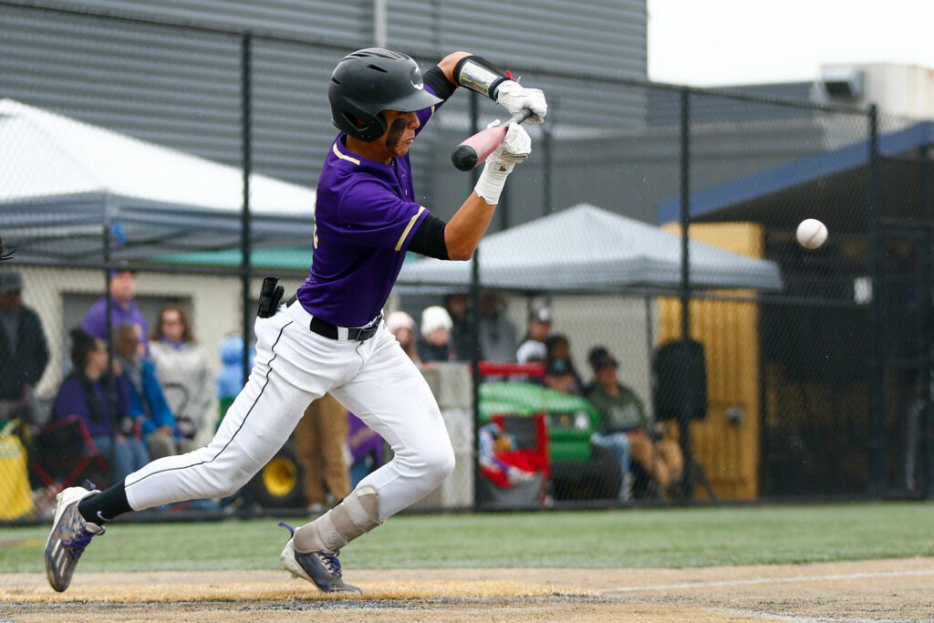Lake Stevens’ Blake Moser lays down a bunt during a playoff loss to Bothell on Saturday, May 4, 2024, in Lake Stevens, Washington. (Ryan Berry / The Herald)
