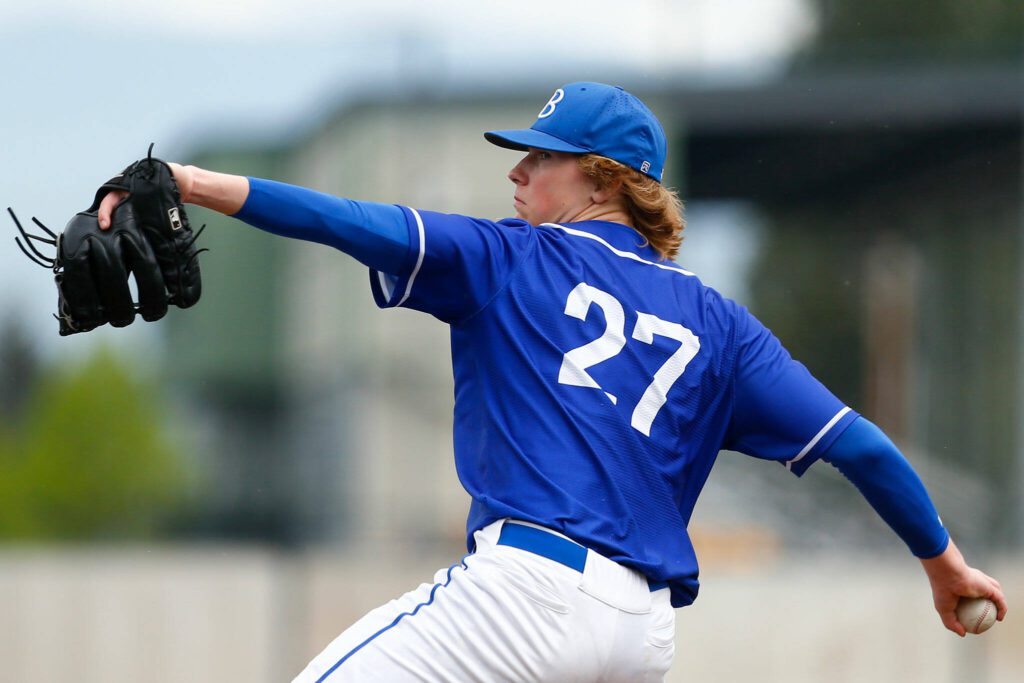 Bothell’s starting pitcher Brady Hallen delivers a pitch during a playoff baseball game against Lake Stevens on Saturday, May 4, 2024, in Lake Stevens, Washington. (Ryan Berry / The Herald)
