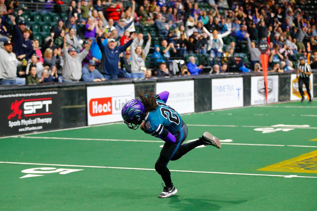 Wideout JR Nelson comes down with the Washington Wolfpack’s first home touchdown on a long throw from Jacob Ta’ase during the team’s inaugural home opener against Billings on Sunday, May 5, 2024, a Angel of the Winds Arena in Everett, Washington. (Ryan Berry / The Herald)
