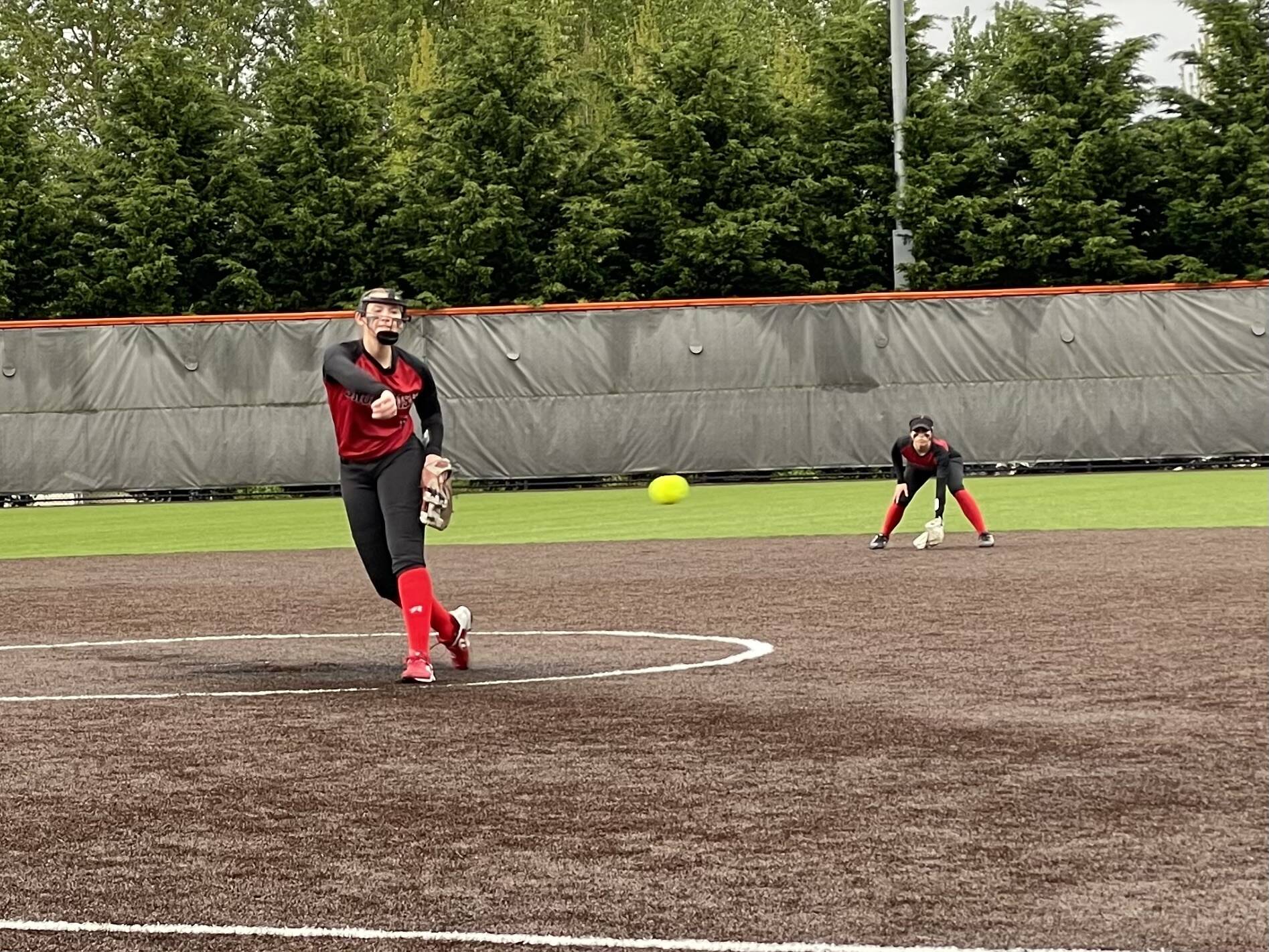 Snohomish pitcher Abby Edwards delivers a pitch during a 9-3 victory over Monroe in a Wesco 3A/2A softball game Monday at Monroe High School (Aaron Coe / The Herald0